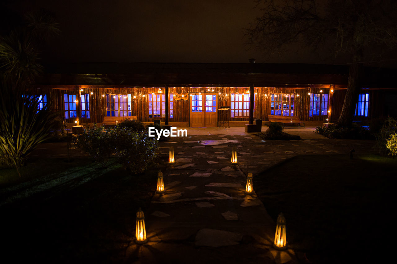 Exterior of illuminated house at night