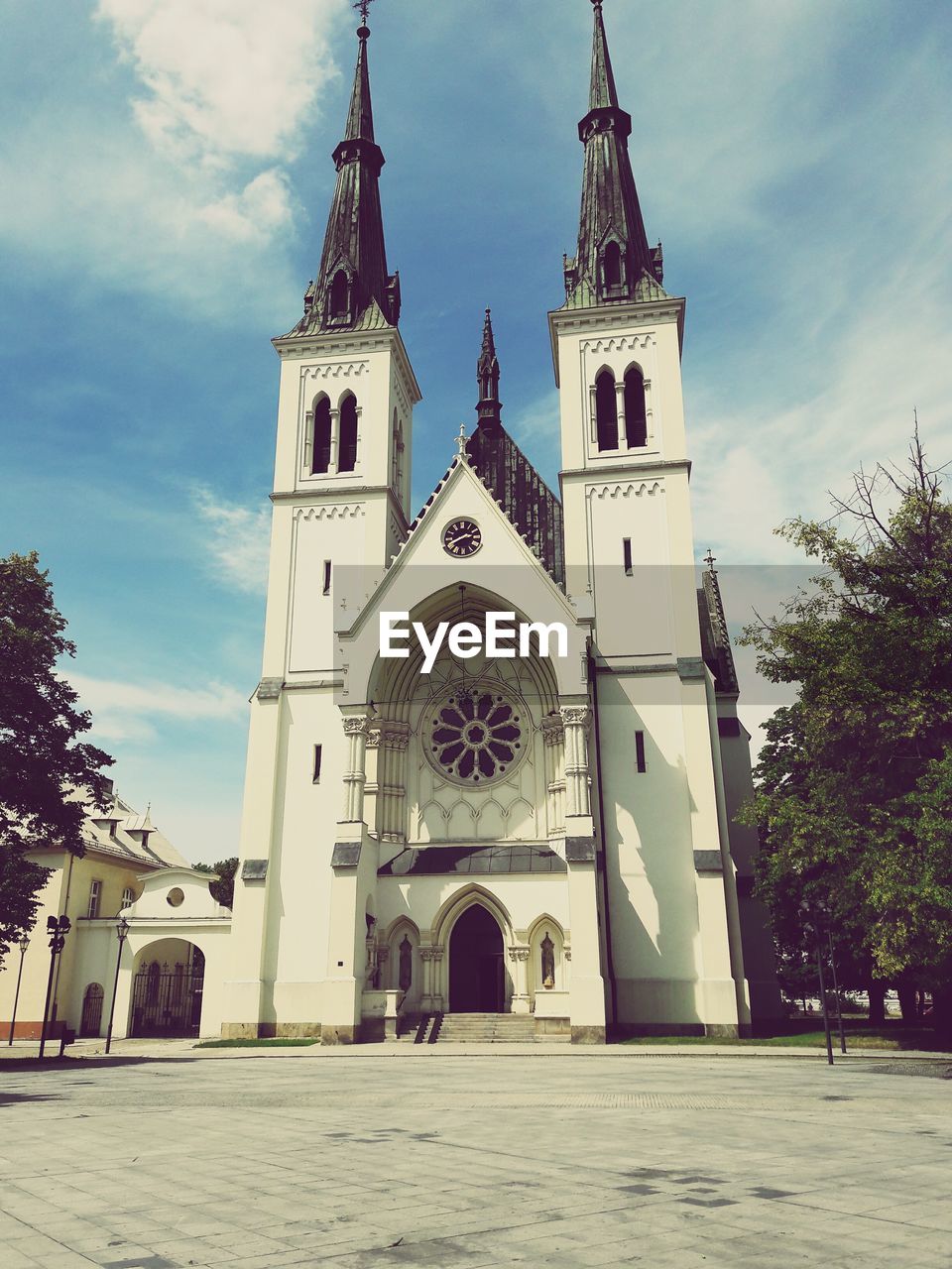 FACADE OF CHURCH AGAINST SKY