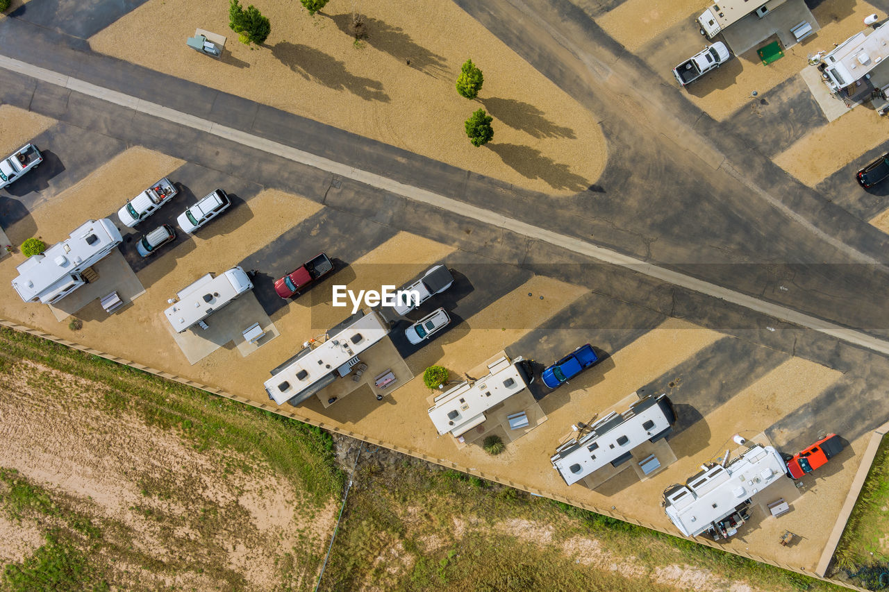 HIGH ANGLE VIEW OF CARS ON ROAD