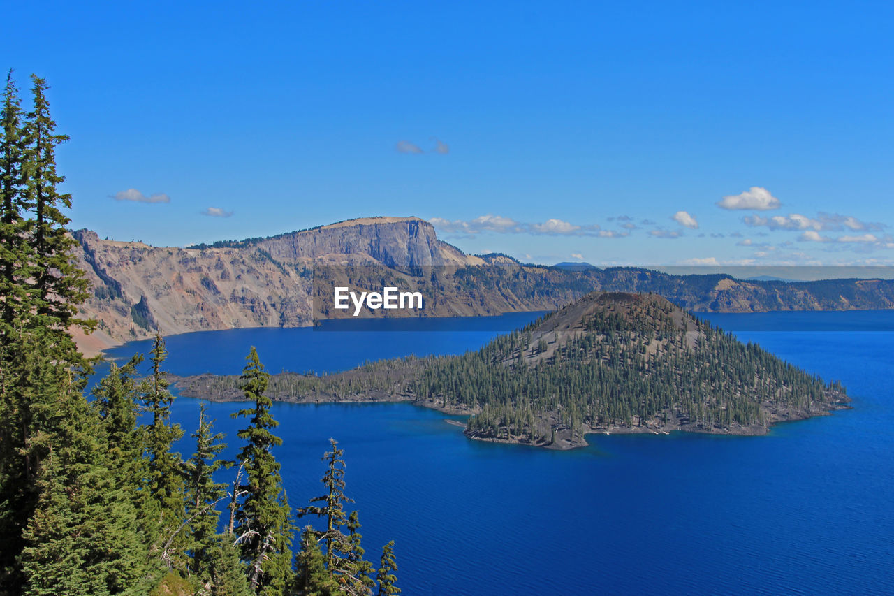 SCENIC VIEW OF BAY AGAINST SKY