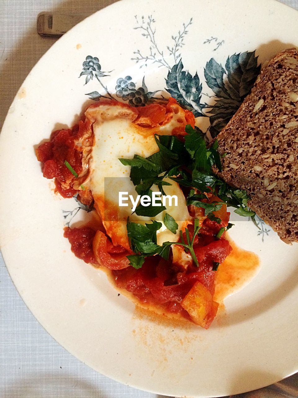 High angle view of fresh shakshouka served in plate