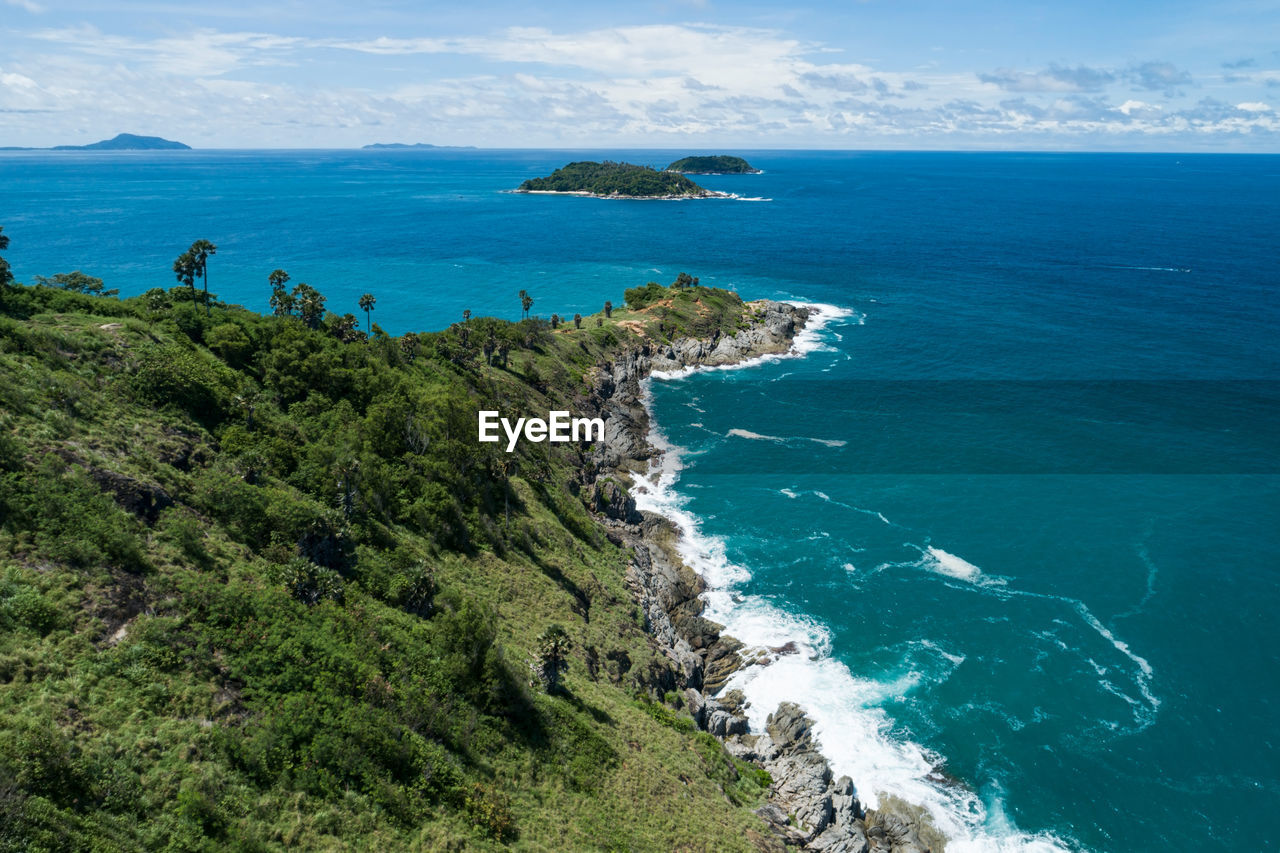 HIGH ANGLE VIEW OF BEACH AGAINST SKY