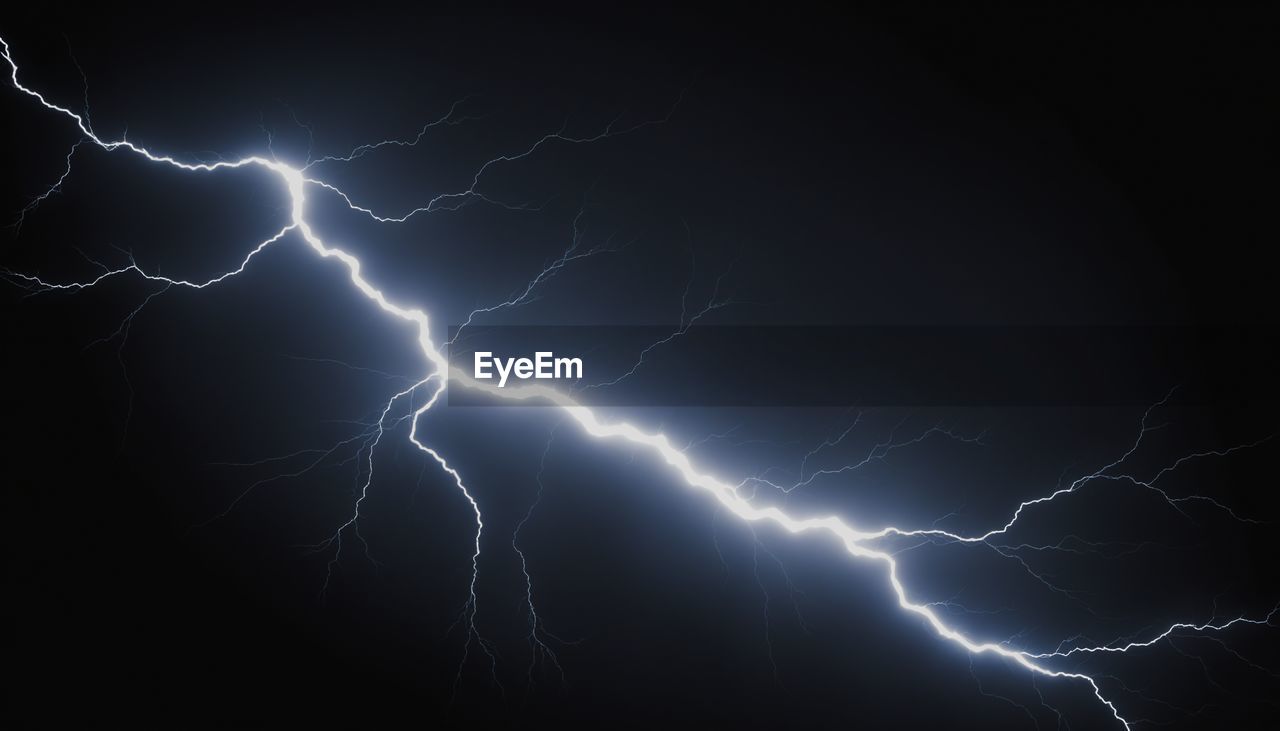 lightning, power in nature, storm, thunderstorm, cloud, beauty in nature, forked lightning, thunder, electricity, warning sign, sky, bolt, sign, dramatic sky, communication, storm cloud, night, environment, extreme weather, nature, wet, no people, rain, overcast, meteorology, cable, outdoors, flash, dark, power supply, violence, awe, aggression, atmospheric mood, monsoon, scenics - nature, power generation