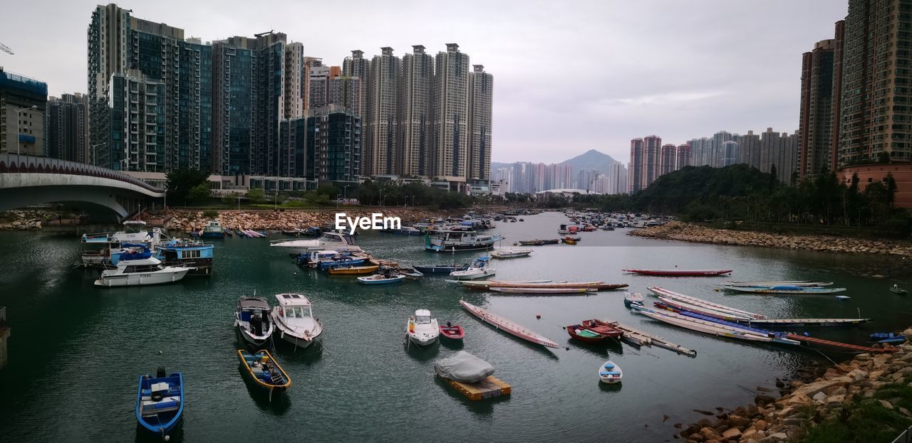 High angle view of river amidst buildings in city