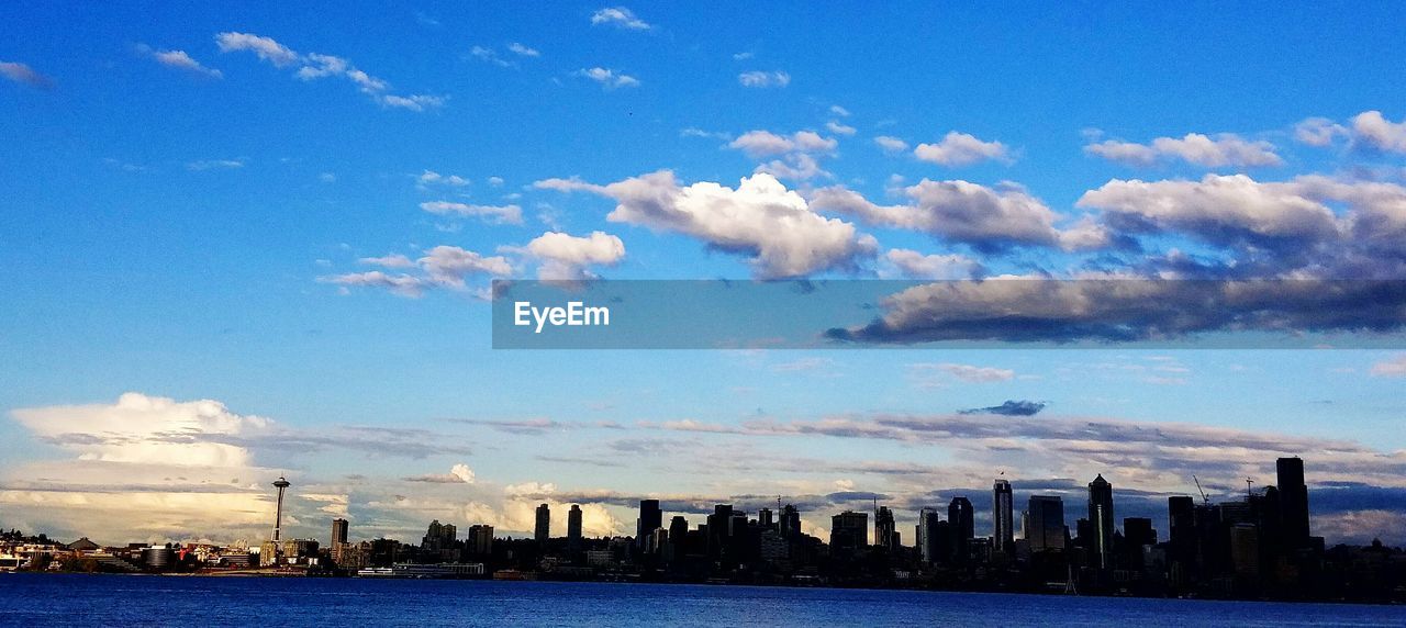 View of city against cloudy sky