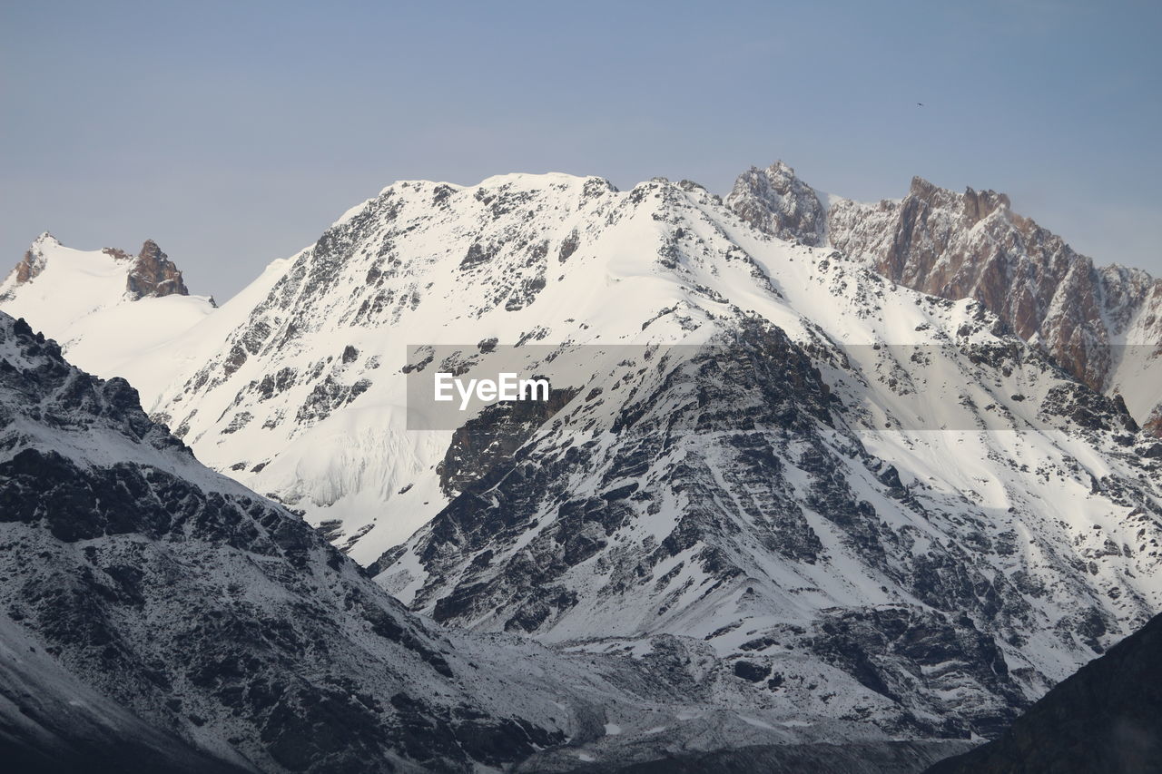 Scenic view of snow covered mountains