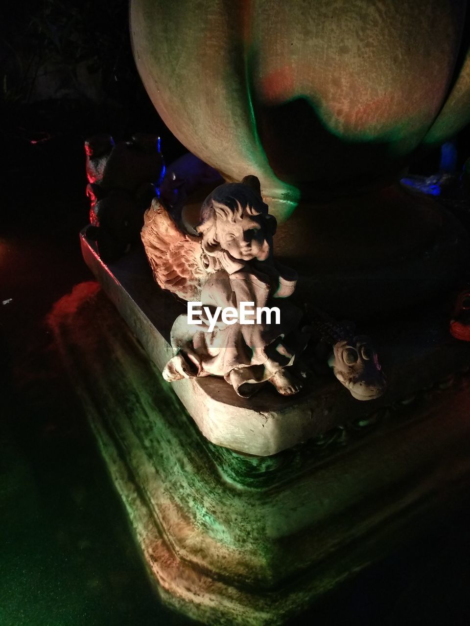 HIGH ANGLE VIEW OF BUDDHA STATUE AT NIGHT