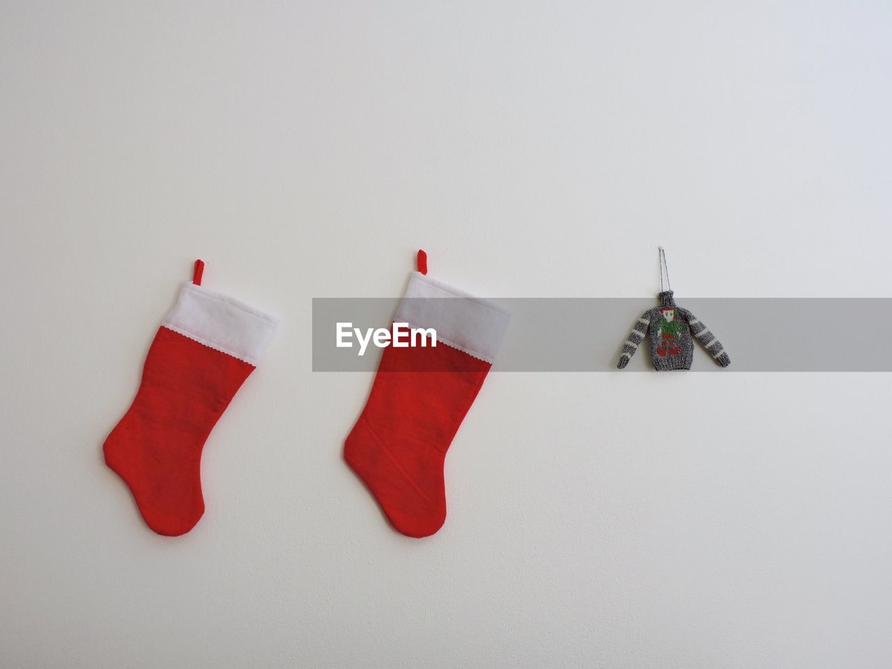 Close-up of christmas stockings over white background