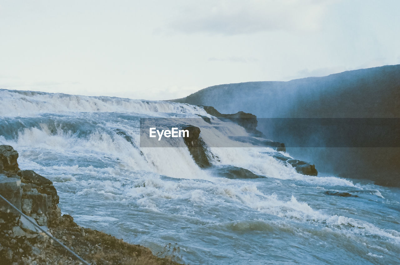 Scenic view of river against sky