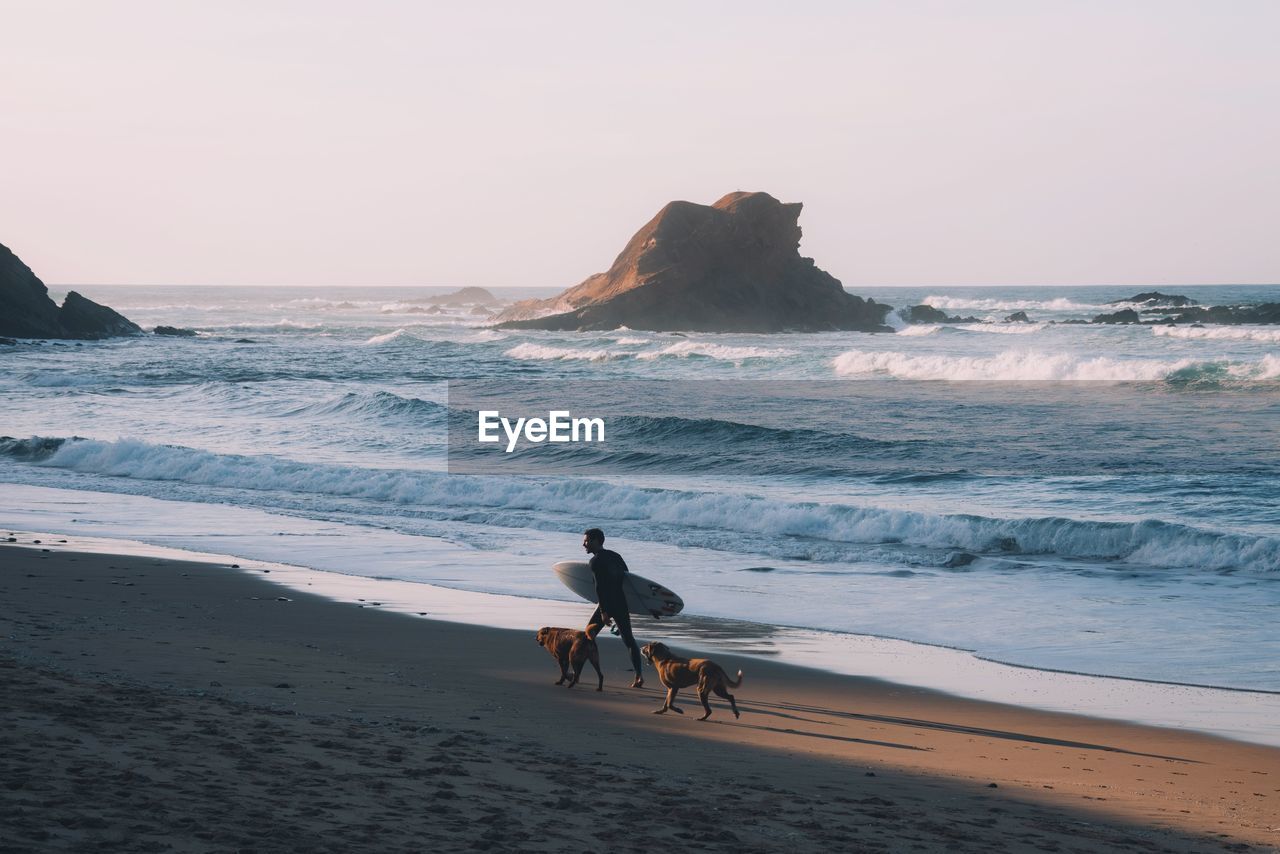 PEOPLE ENJOYING ON BEACH