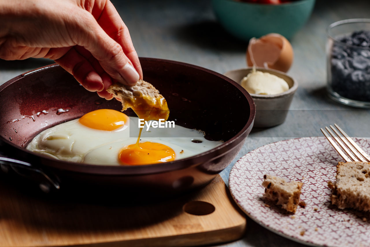 Fried egg. view of two fried eggs on a frying pan. ready to eat with breakfast or lunch