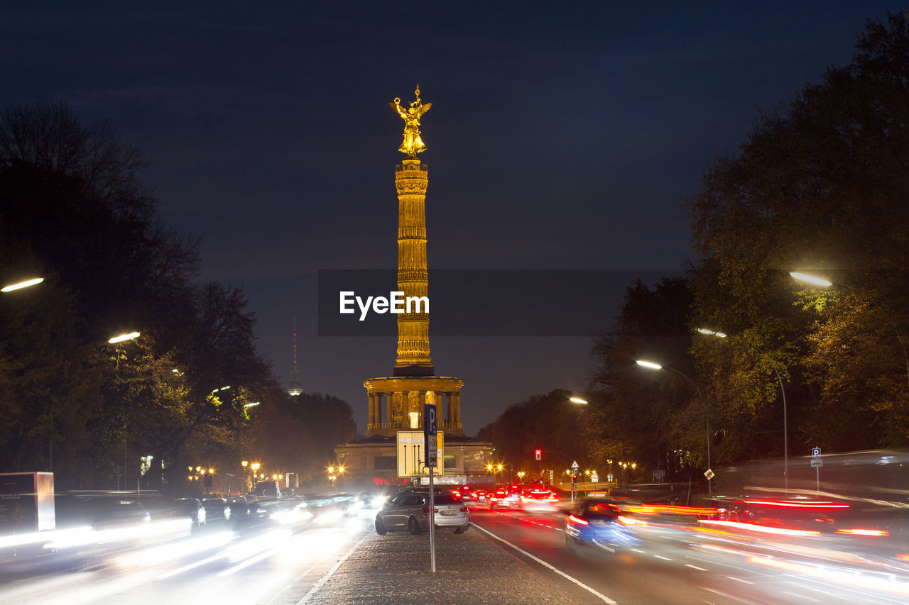 VIEW OF LIGHT STATUE AT NIGHT