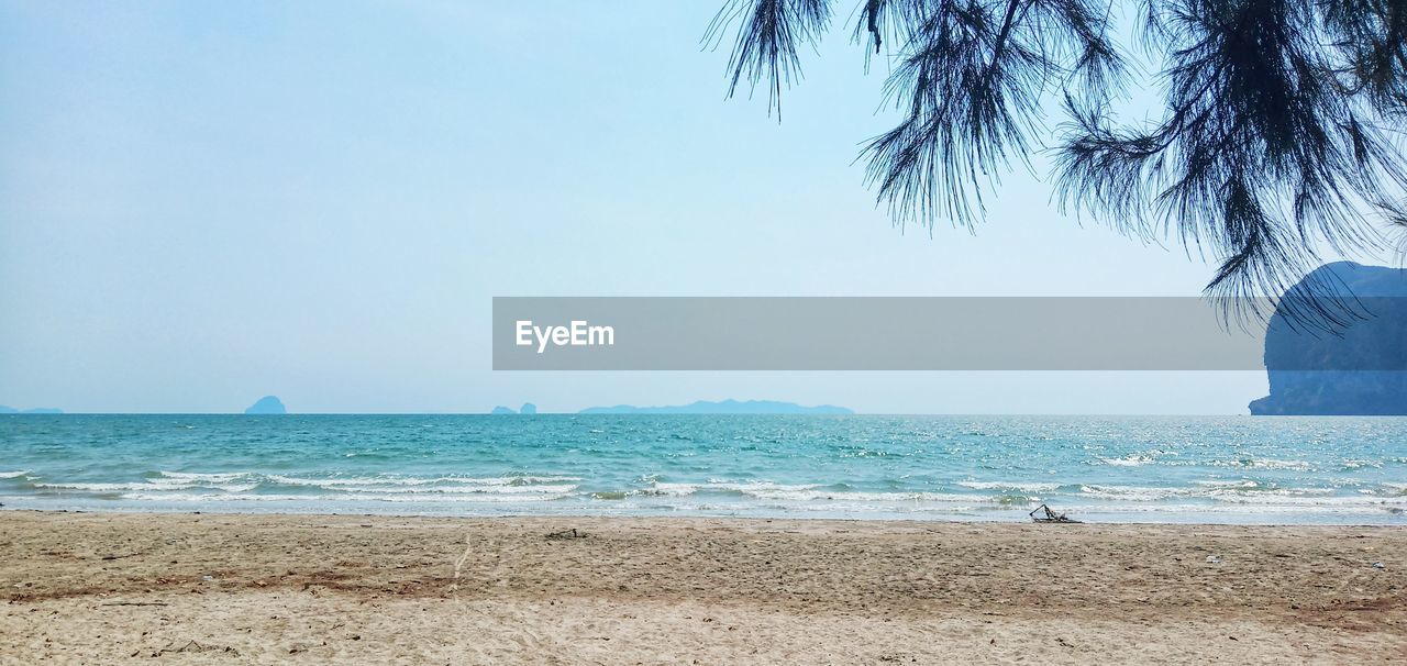 Scenic view of beach against sky