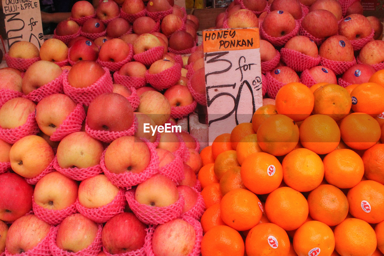 APPLES FOR SALE AT MARKET STALL