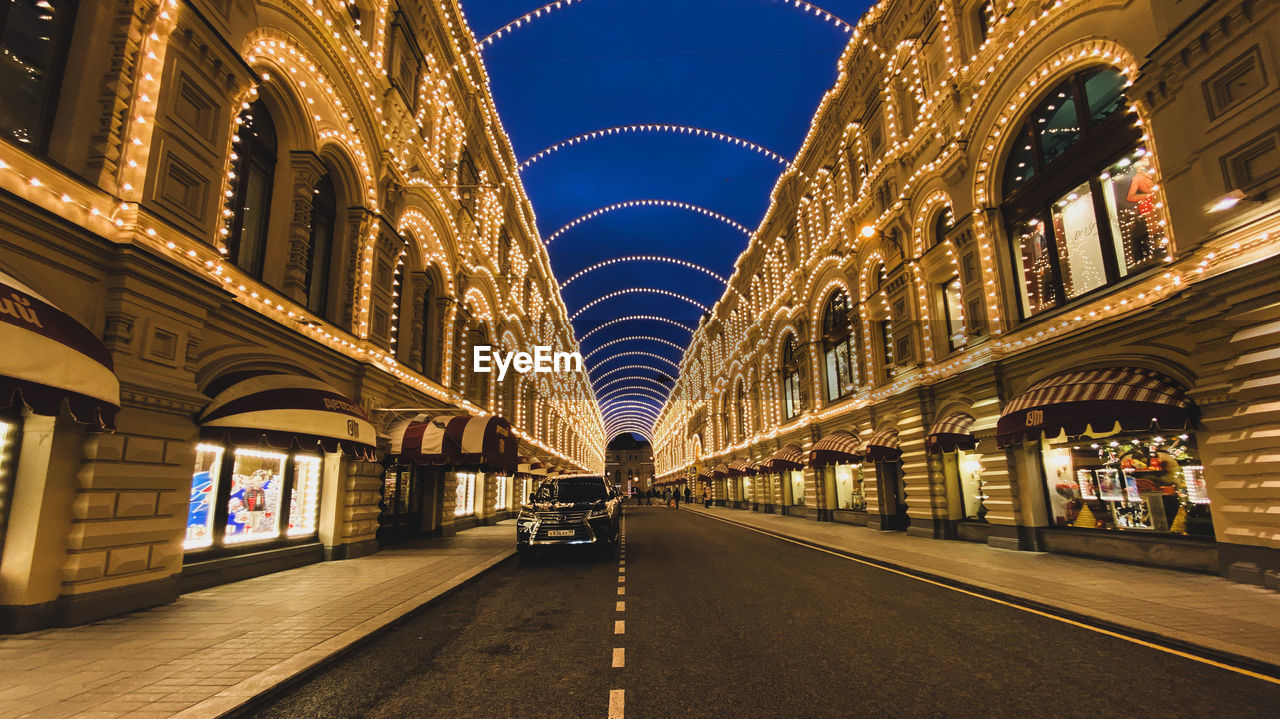 ILLUMINATED BUILDINGS AT NIGHT