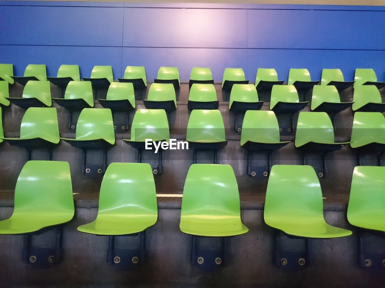 View of empty chairs in auditorium