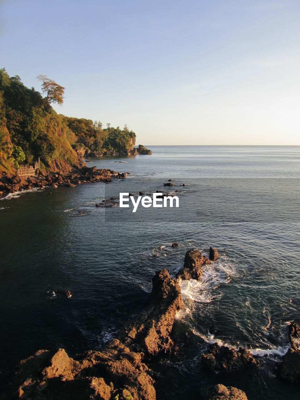 Scenic view of sea against clear sky