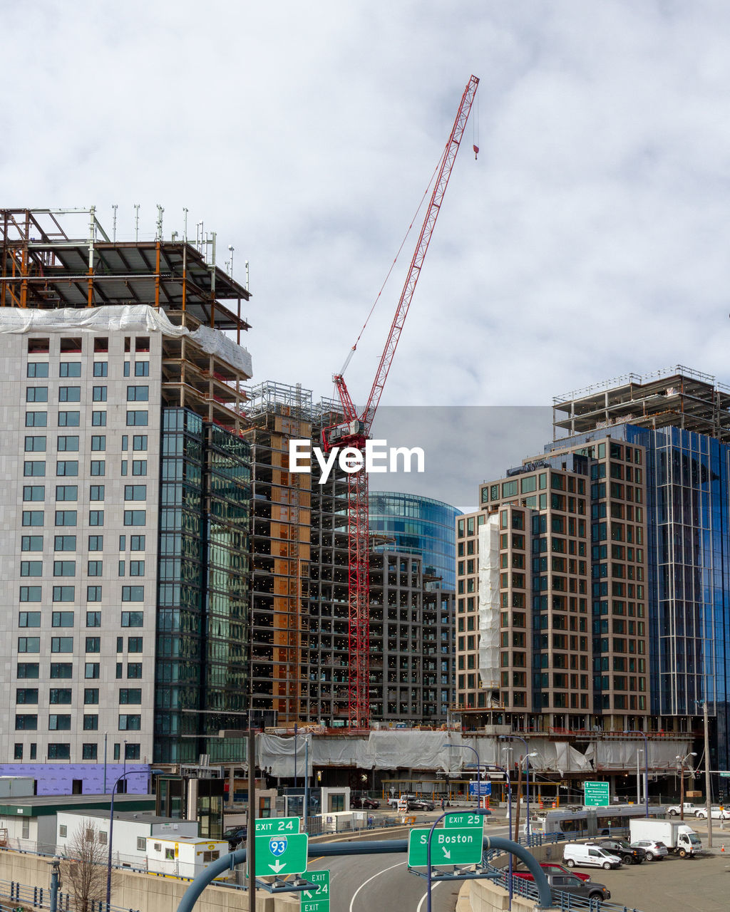 Low angle view of buildings being built against sky in city. boston 