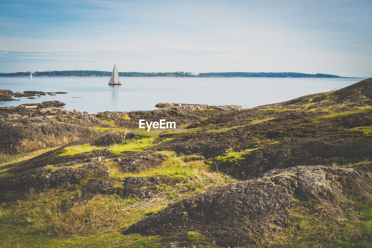 Scenic view of calm sea against sky