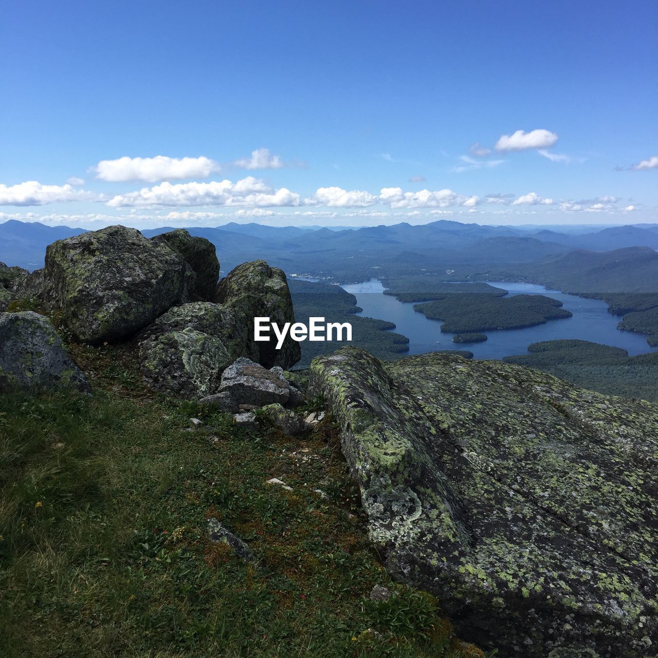 Scenic view of landscape against blue sky