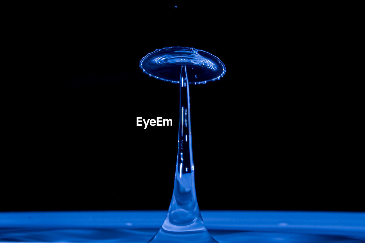 CLOSE-UP OF WATER DROP ON GLASS