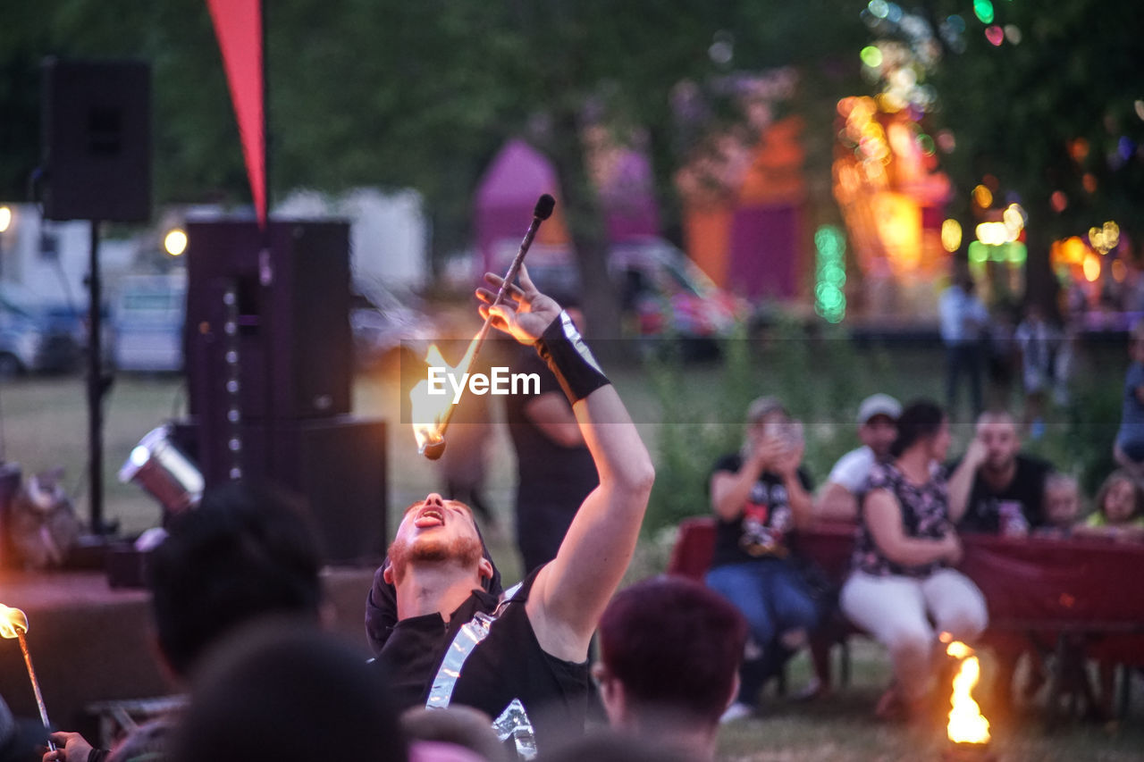 GROUP OF PEOPLE WATCHING FIRE