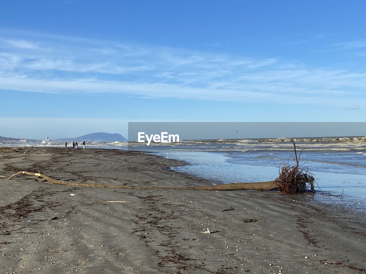 water, sky, sea, land, beach, shore, body of water, nature, scenics - nature, coast, sand, ocean, beauty in nature, tranquility, tranquil scene, cloud, day, no people, wave, horizon, horizon over water, outdoors, non-urban scene, blue, environment, travel destinations, coastline, idyllic, travel, bay