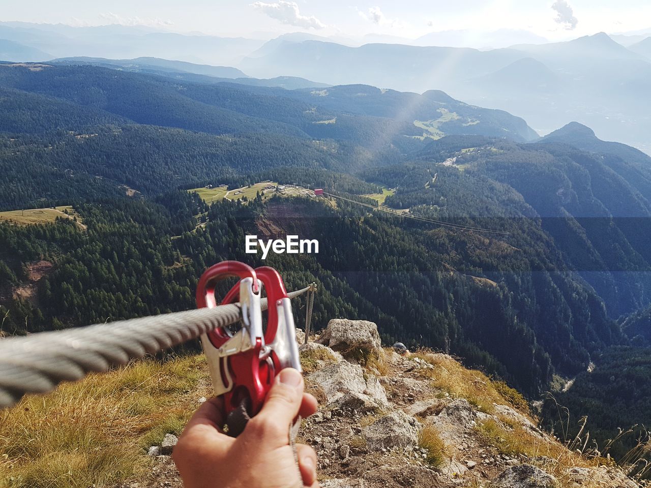 Person on mountain with climbing equipment