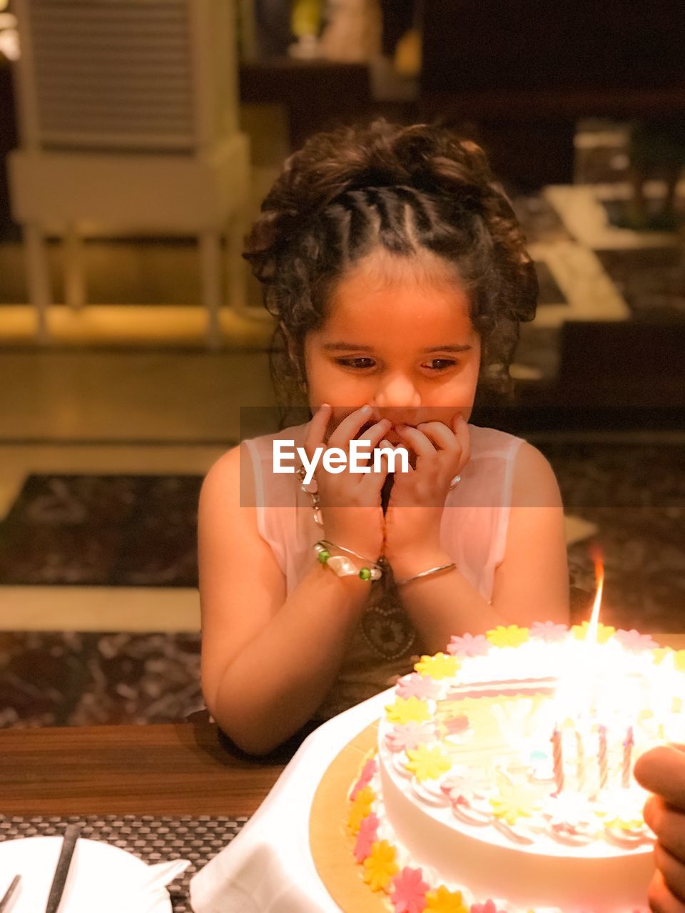 Close-up of girl looking away during birthday celebration
