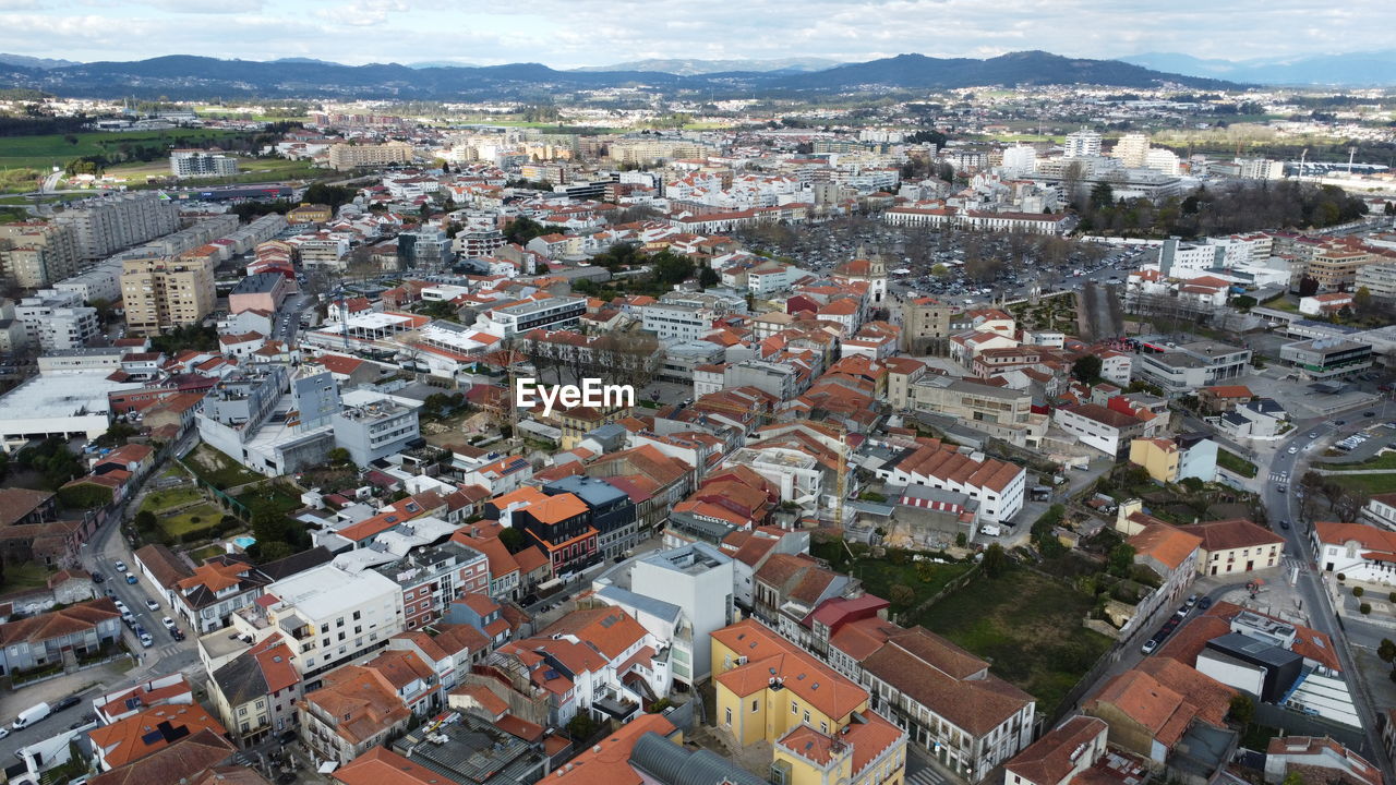 aerial view of townscape against sky