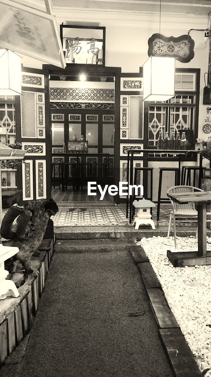 EMPTY TABLES AND CHAIRS IN RESTAURANT