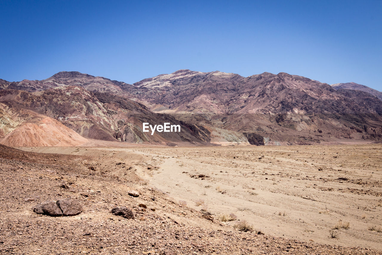Death valley desert against clear sky