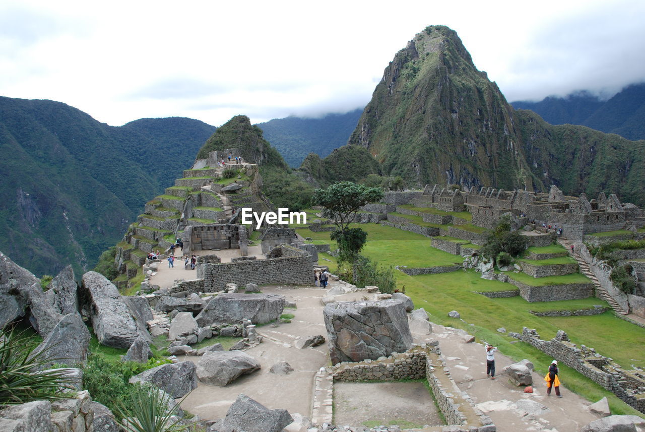 High angle view of rocks at machu picchu in foggy weather