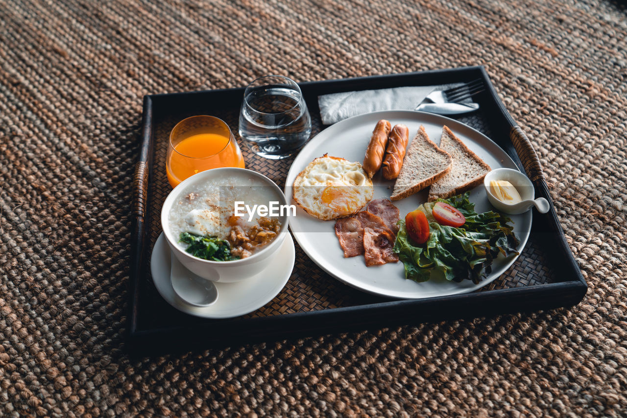 HIGH ANGLE VIEW OF FOOD SERVED ON TABLE