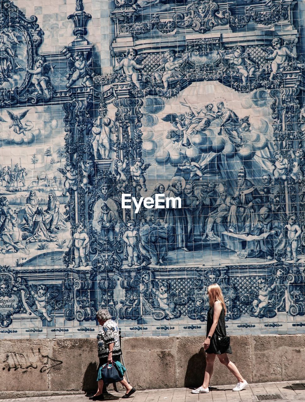 FULL LENGTH OF A MAN AND WOMAN OUTSIDE TEMPLE