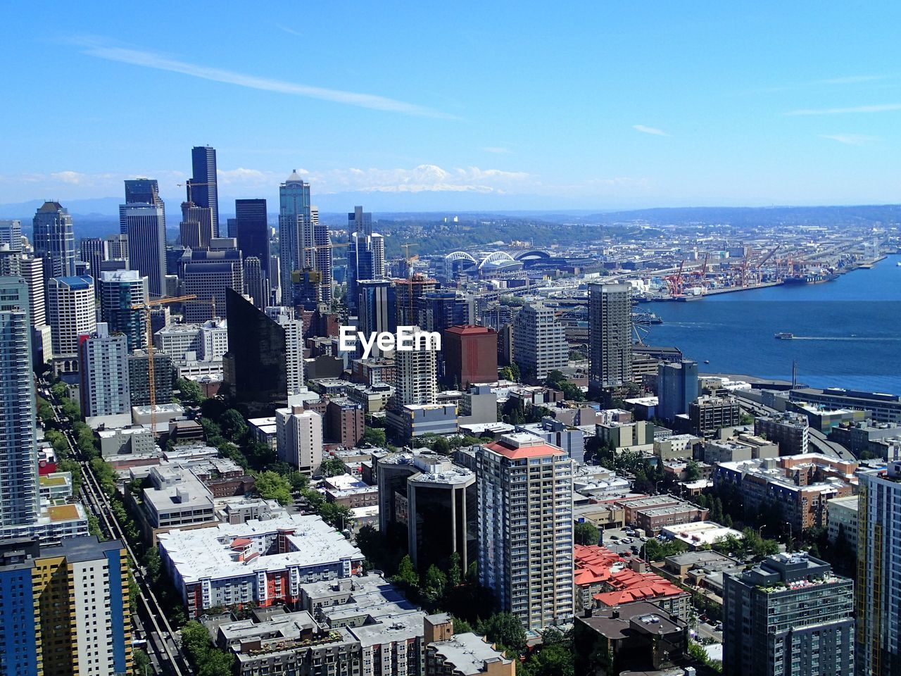 City skyline against blue sky