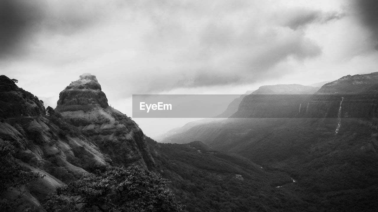 Scenic view of rocky mountains against sky