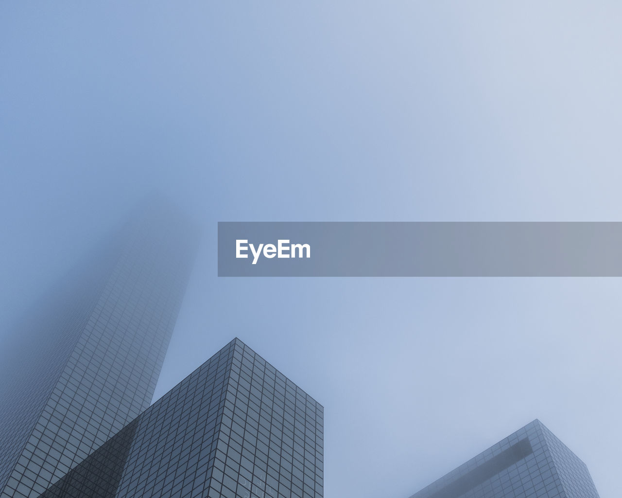 Low angle view of modern building against clear sky