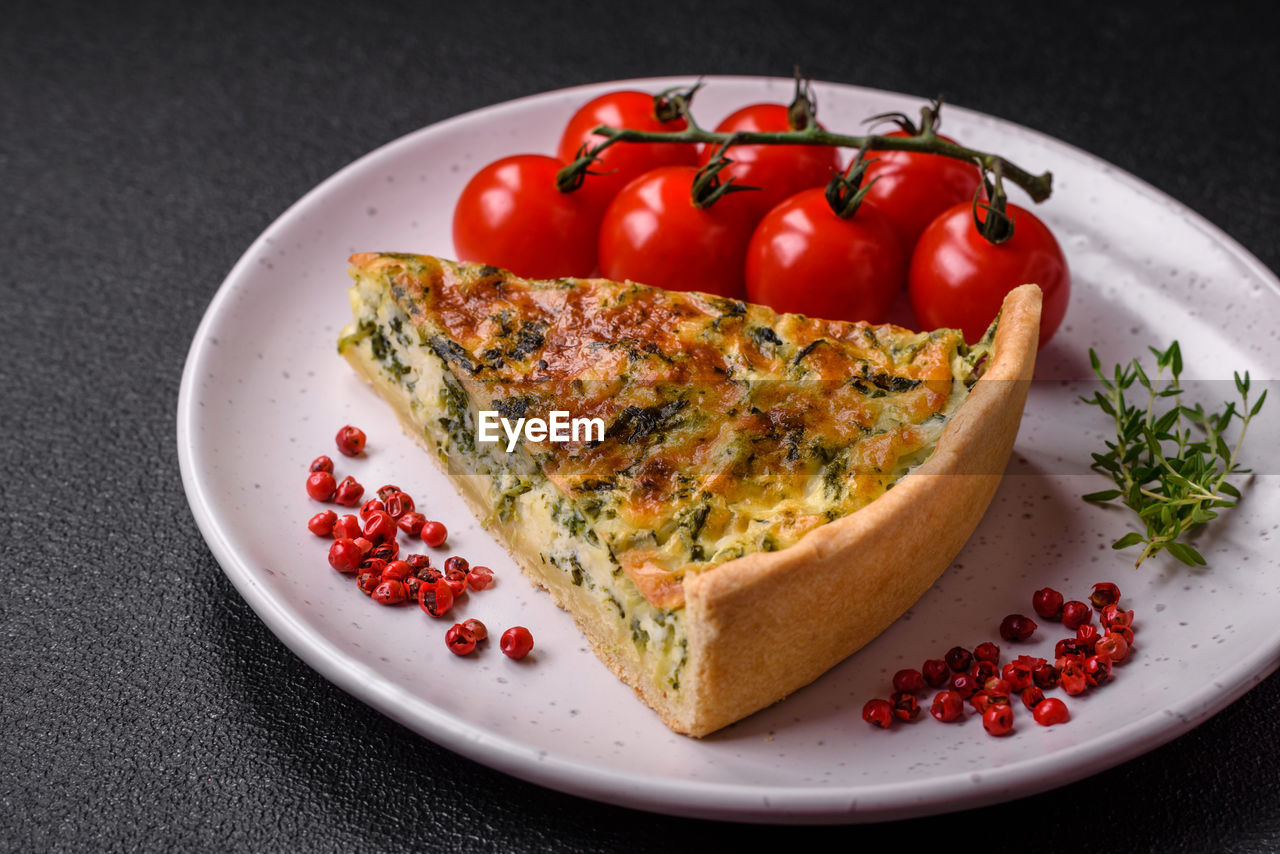 food, food and drink, healthy eating, fruit, fast food, dish, tomato, vegetable, plate, freshness, produce, wellbeing, plant, red, cuisine, meal, breakfast, studio shot, no people, italian food, indoors, quiche, baked, cherry tomato, cheese, vegetarian food, herb, spice, gray