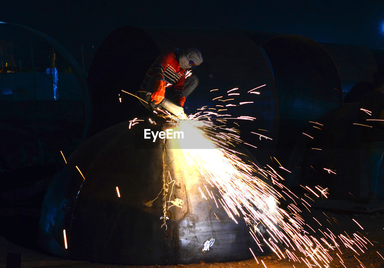 MAN WORKING IN FACTORY