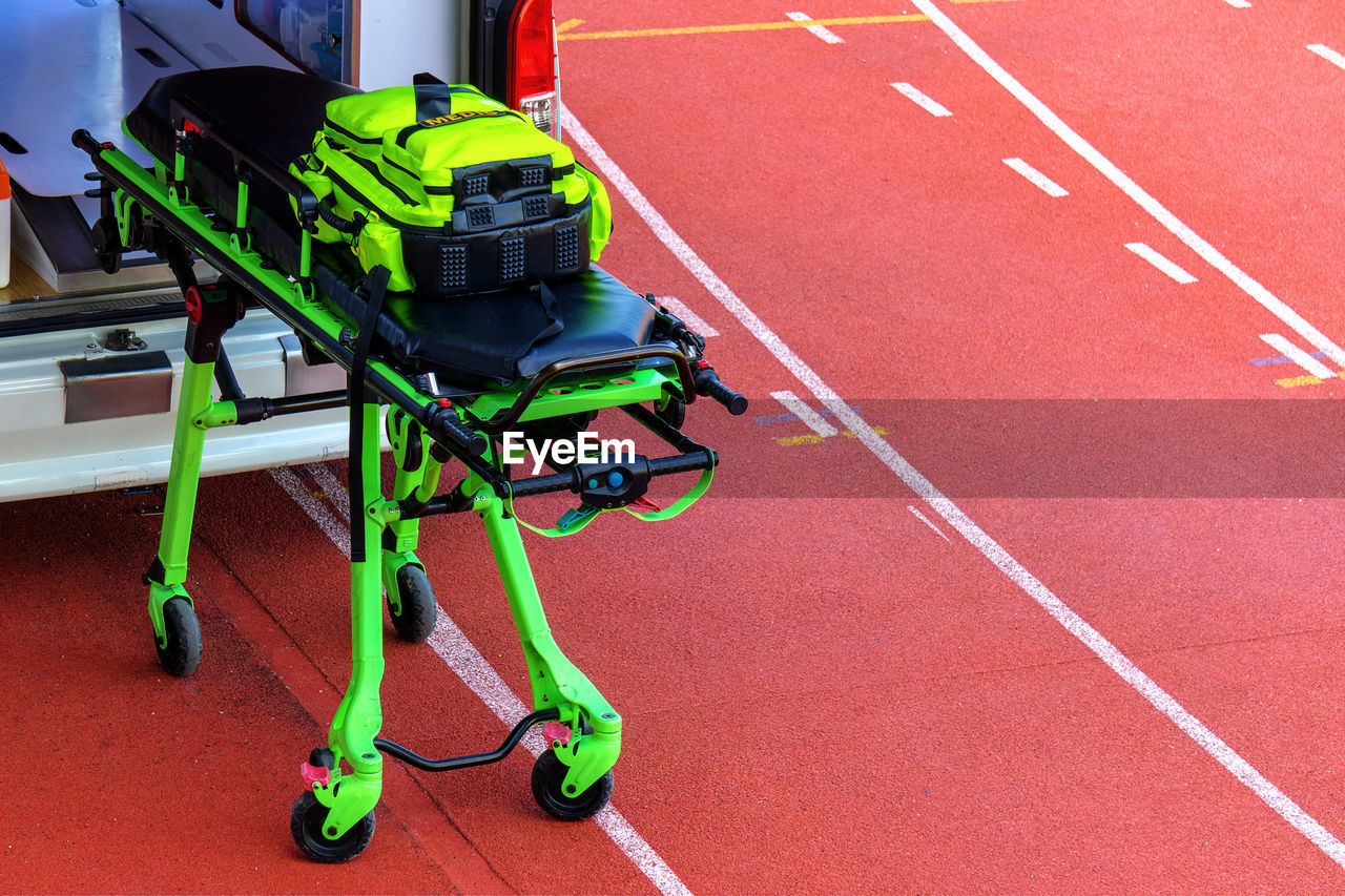 HIGH ANGLE VIEW OF SHOPPING CART ON FLOORING