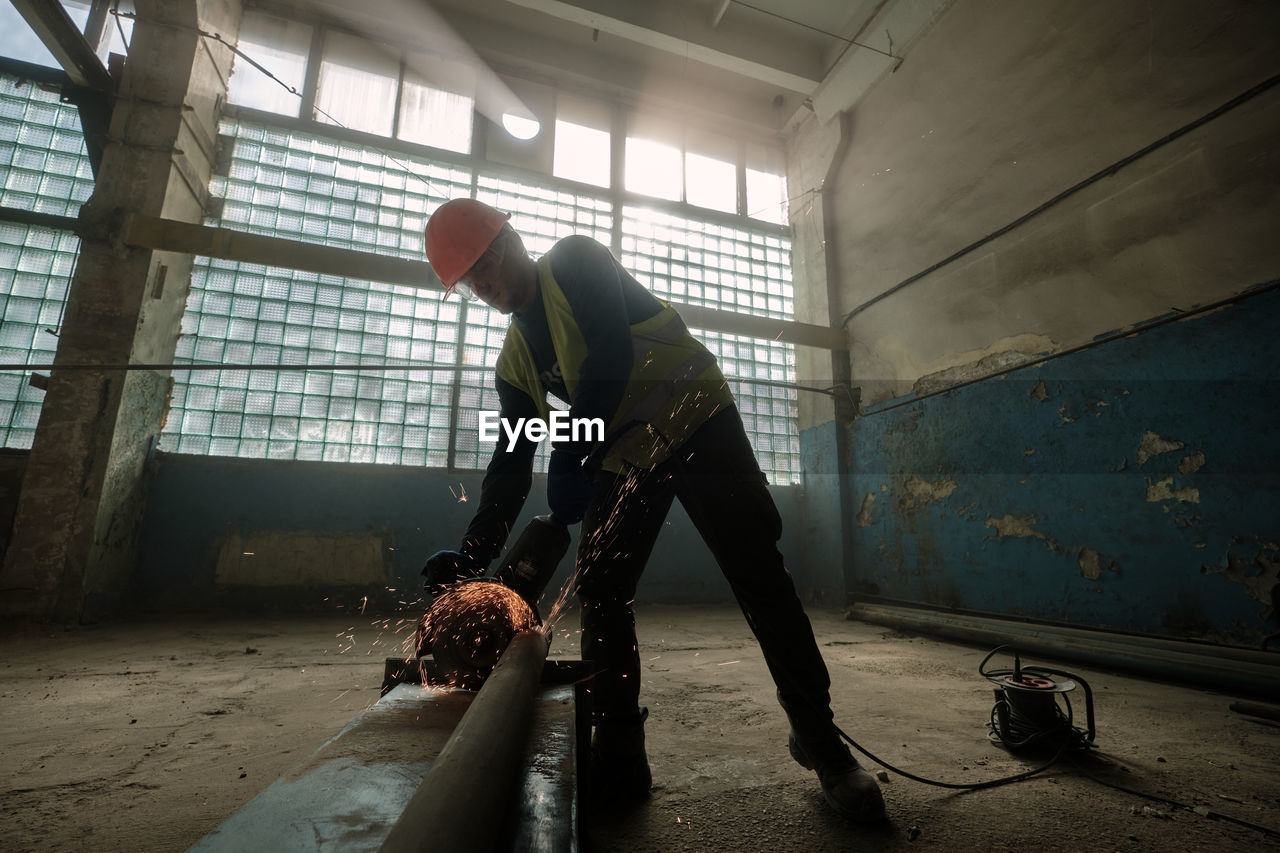 Man working in abandoned building