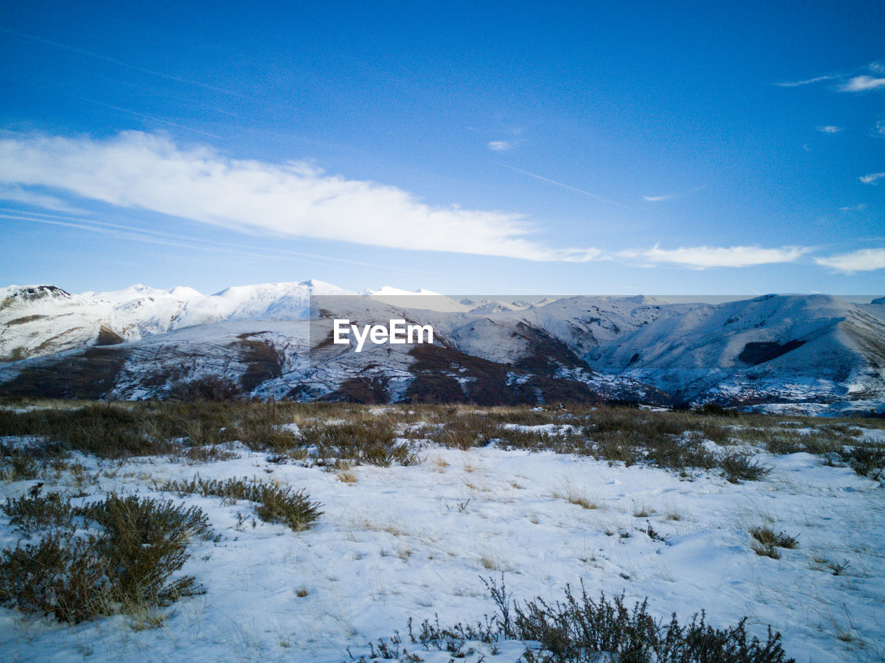 SNOWCAPPED MOUNTAINS AGAINST SKY