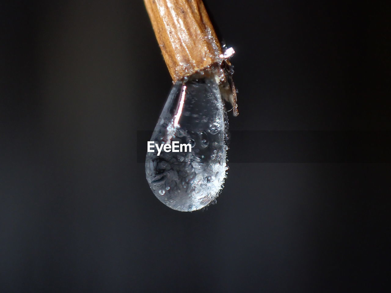 CLOSE-UP OF ICE OVER WATER