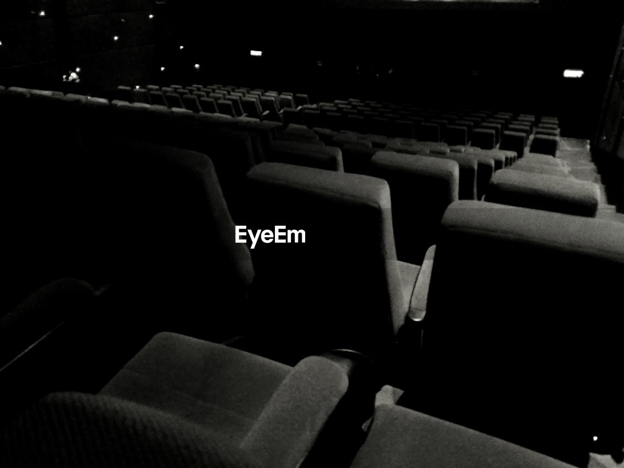 VIEW OF EMPTY CHAIRS IN ROOM