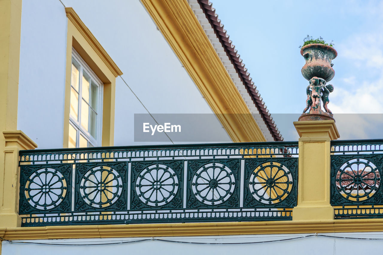  low angle view of building flower pot