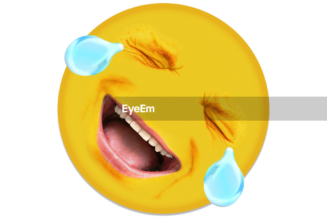 Digital composite image of man with smiley face against yellow background