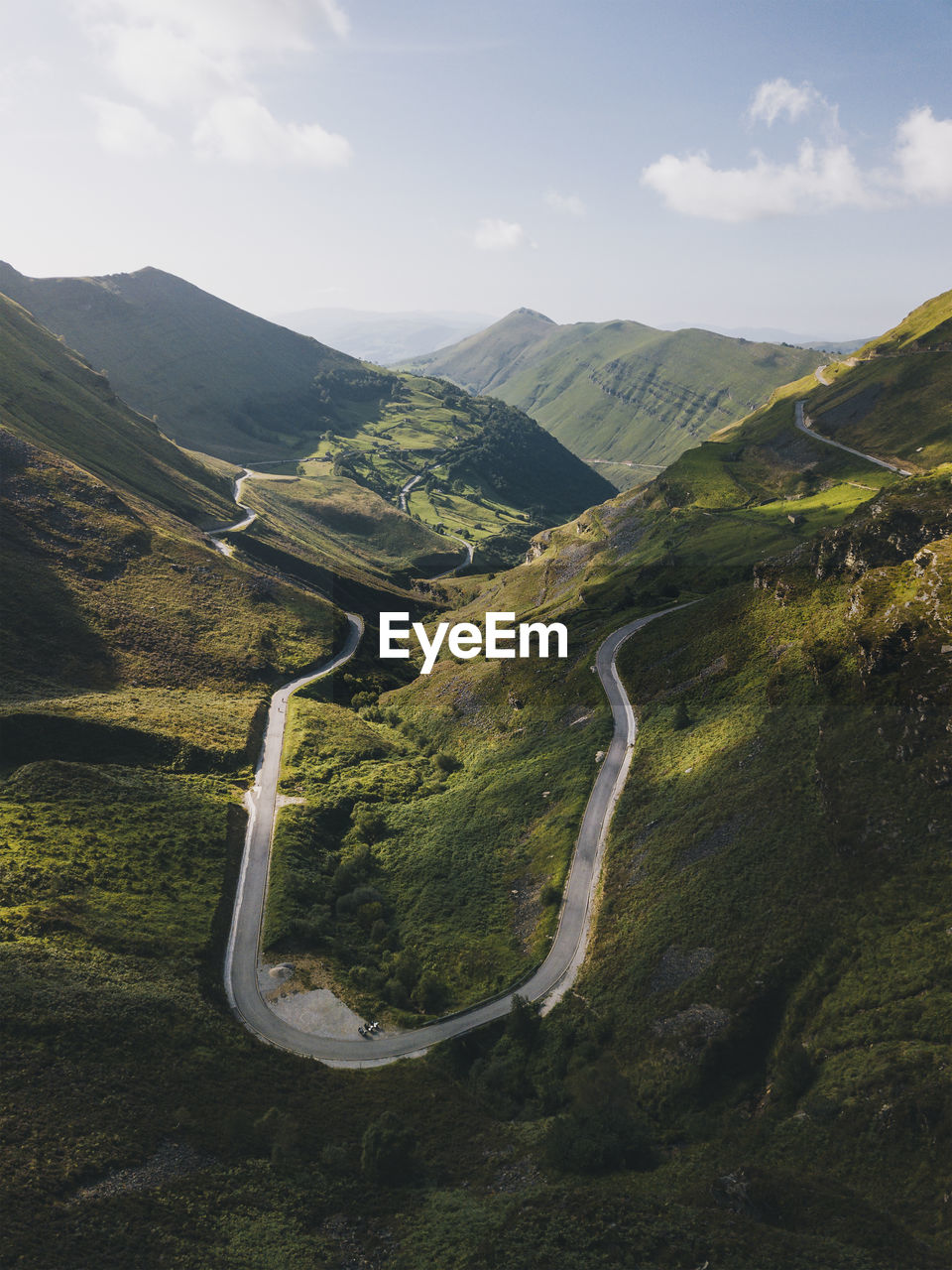 Winding road up to the mountains in valles pasiegos cantabria, spain