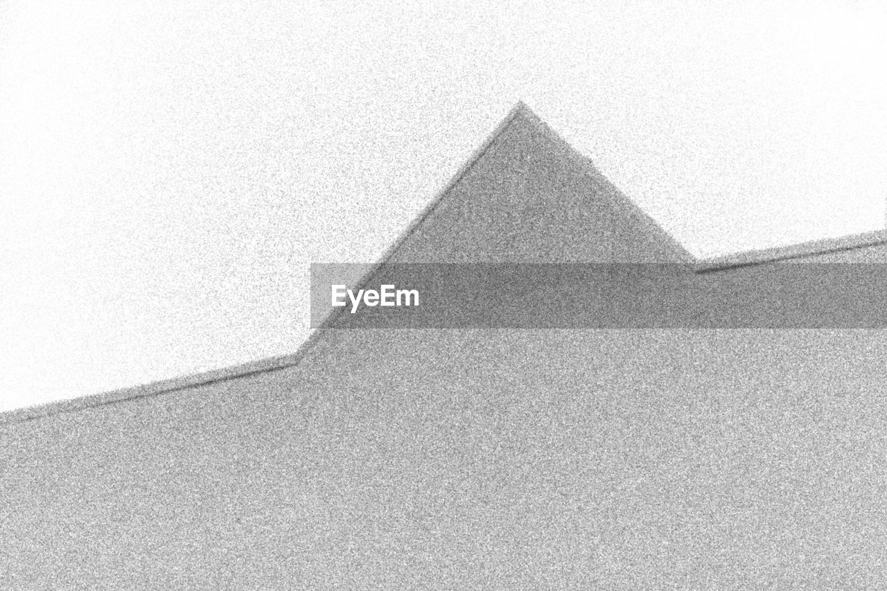 triangle shape, pyramid, architecture, no people, day, built structure, clear sky, outdoors, geometry, close-up