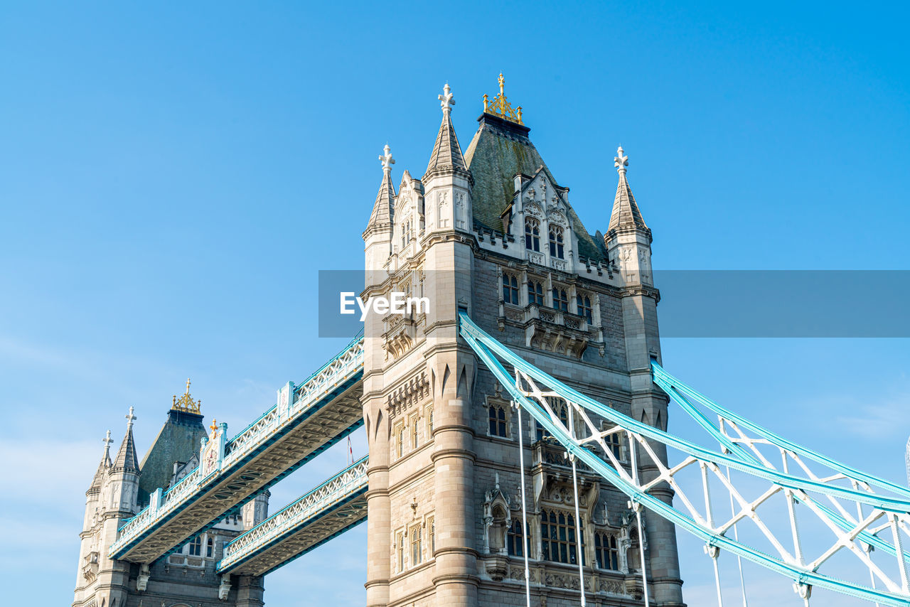 architecture, built structure, landmark, sky, travel destinations, building exterior, blue, city, travel, nature, tower, tourism, clear sky, no people, the past, history, spire, low angle view, building, bridge, sunny, day, clock tower, outdoors, skyscraper